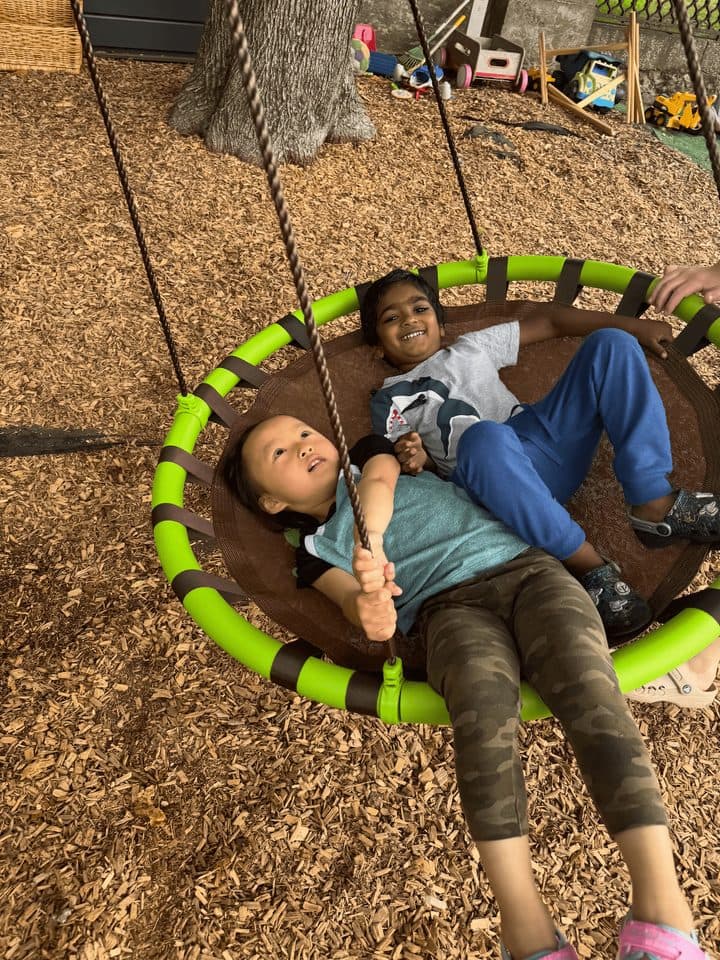 Friends at play on the campus lawn