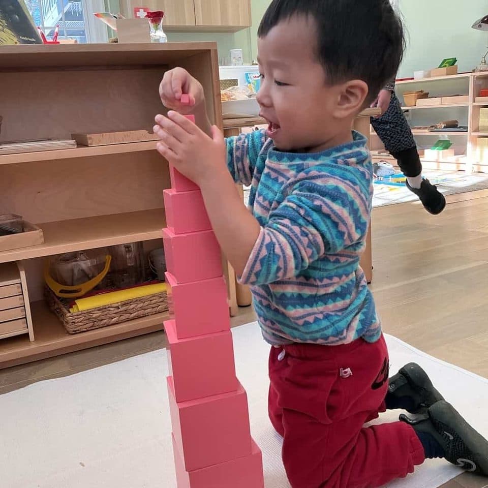 A child working with Montessori materials